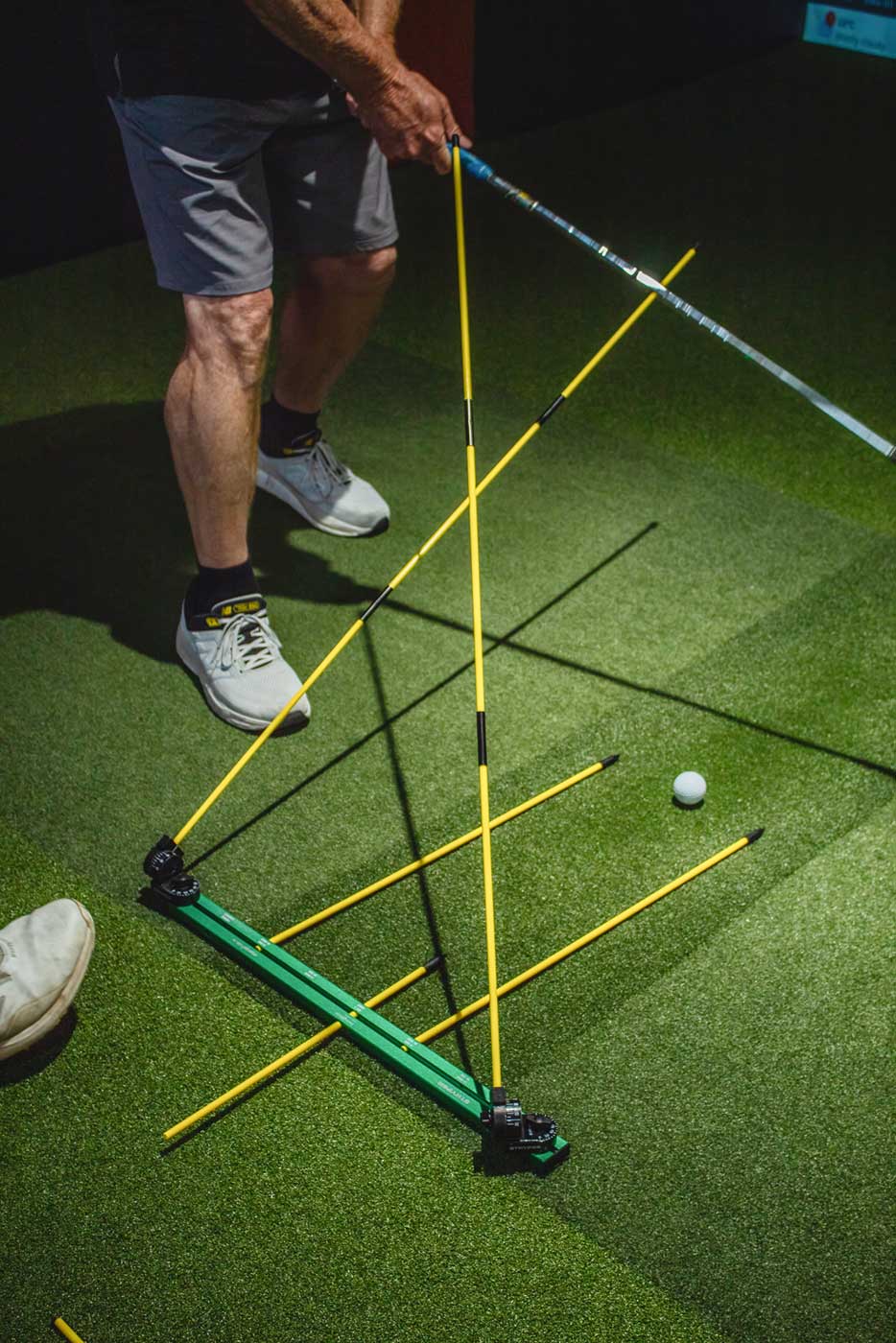 Stryper SwingMate with 5 alignment sticks creating a swing path maze