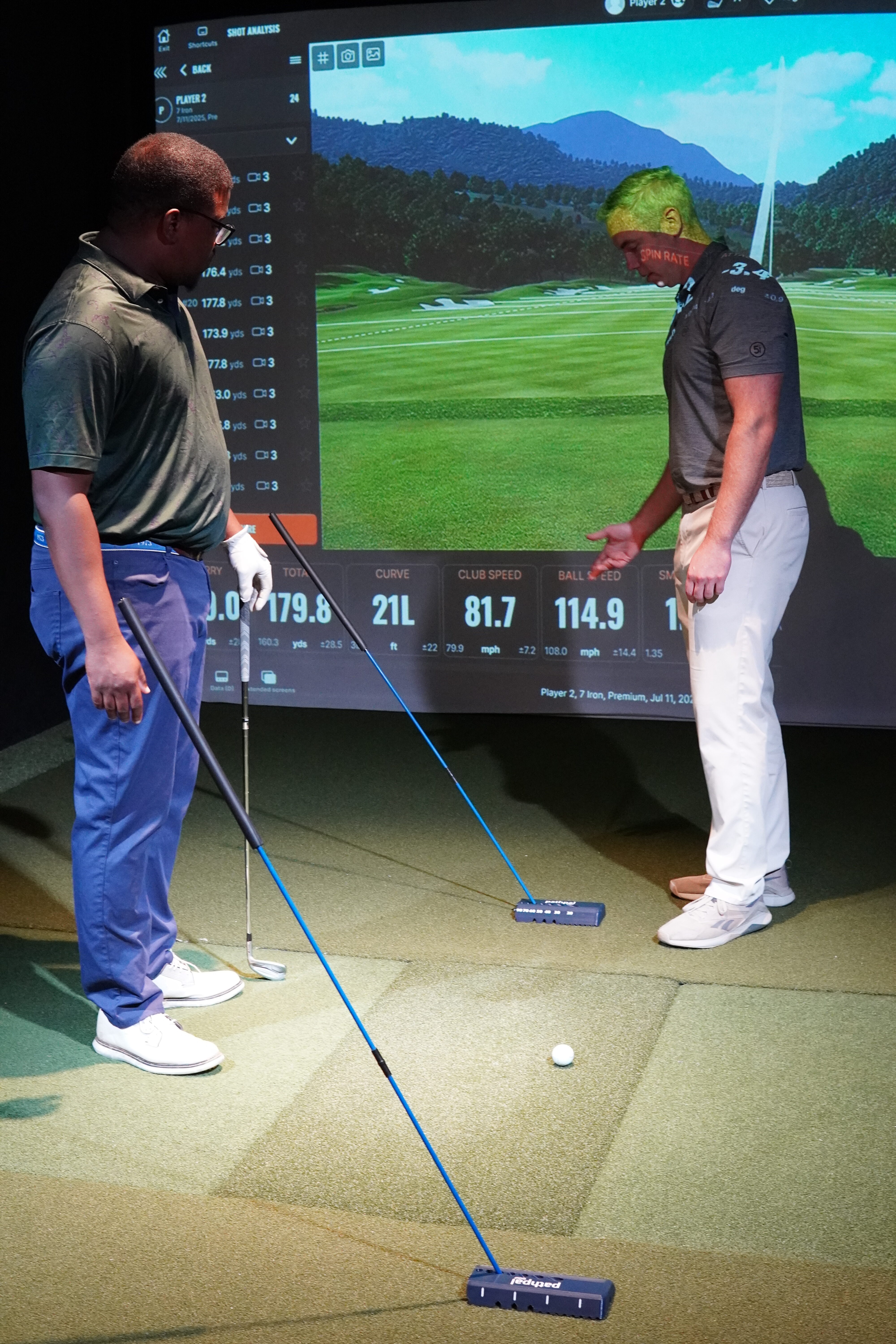 Golf instructor using the pathpal split design during a lesson
