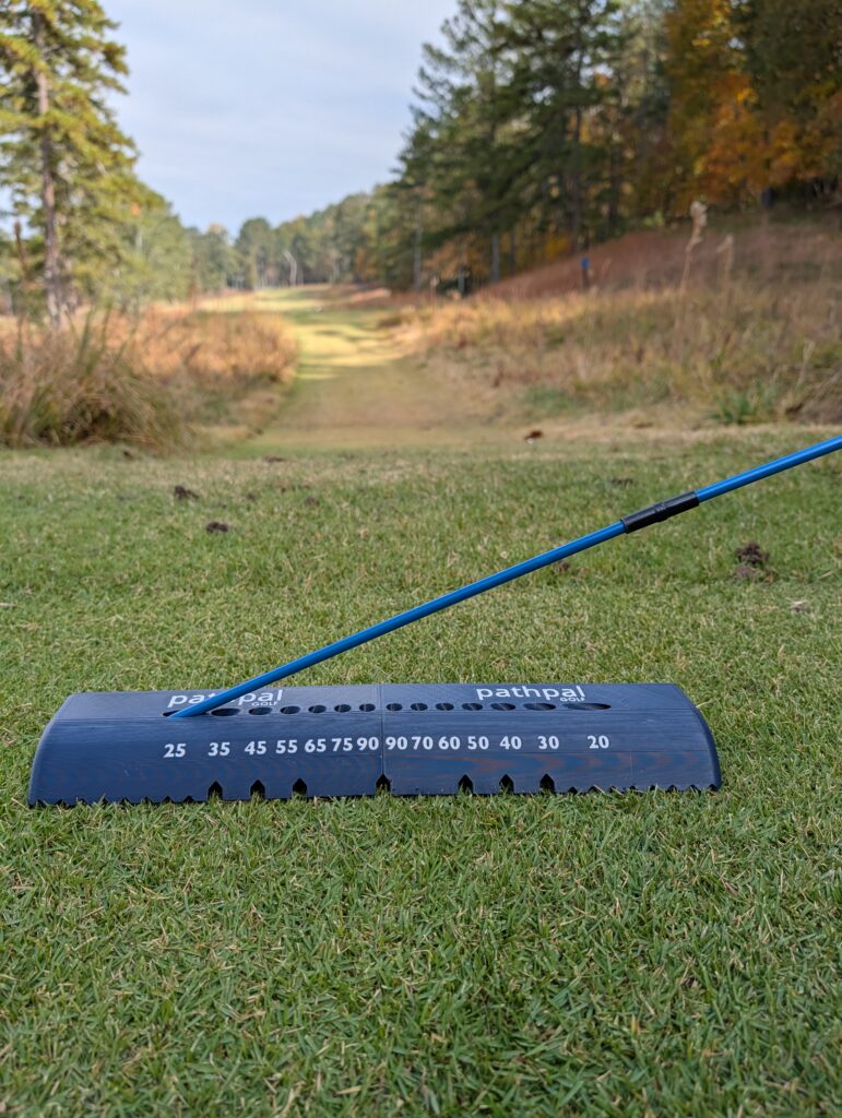 The pathpal Golf alignment stick holder on a course