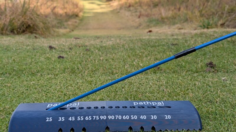 The pathpal Golf alignment stick holder on a course