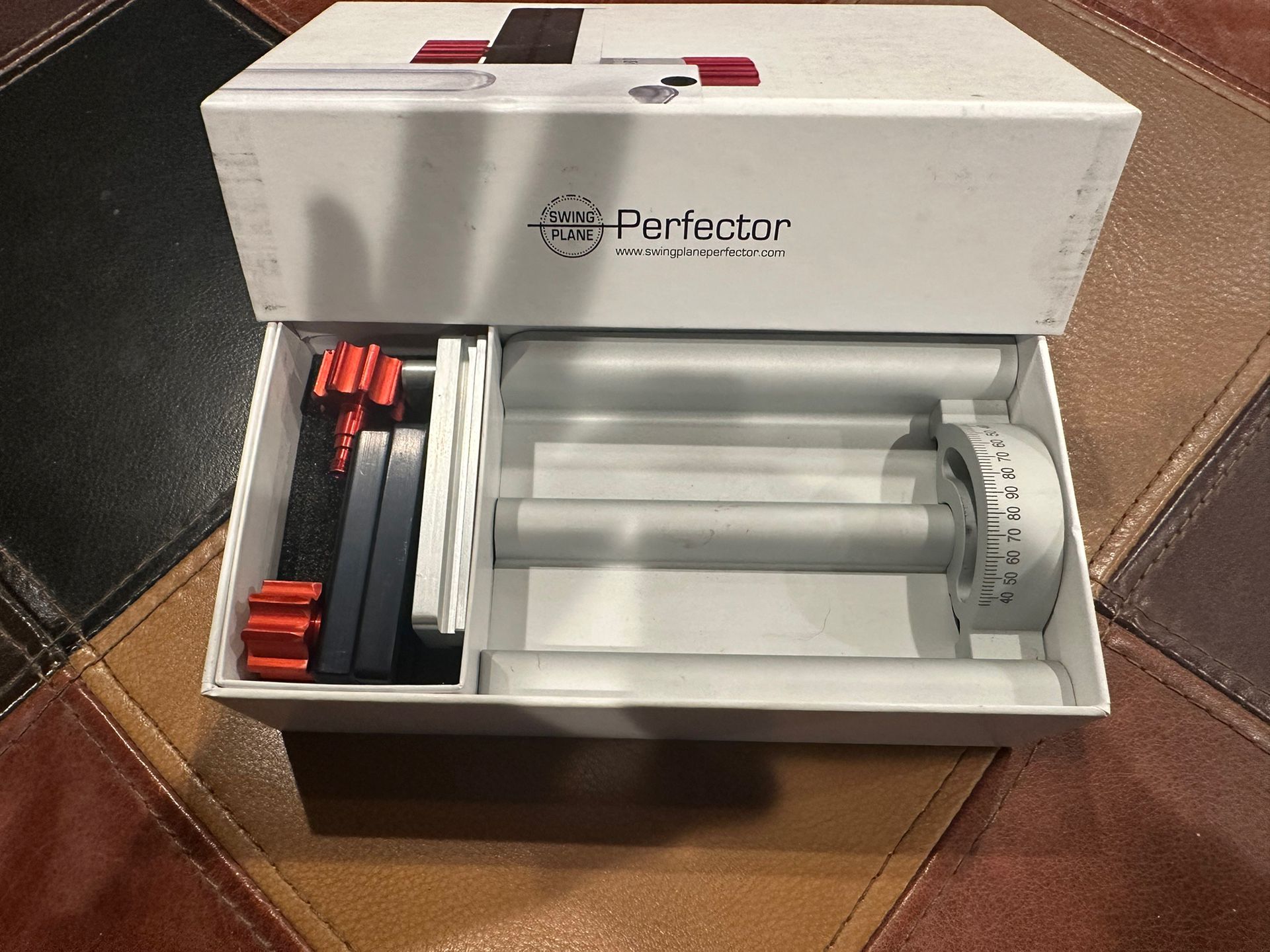 Swing Plane Perfector components in original packaging