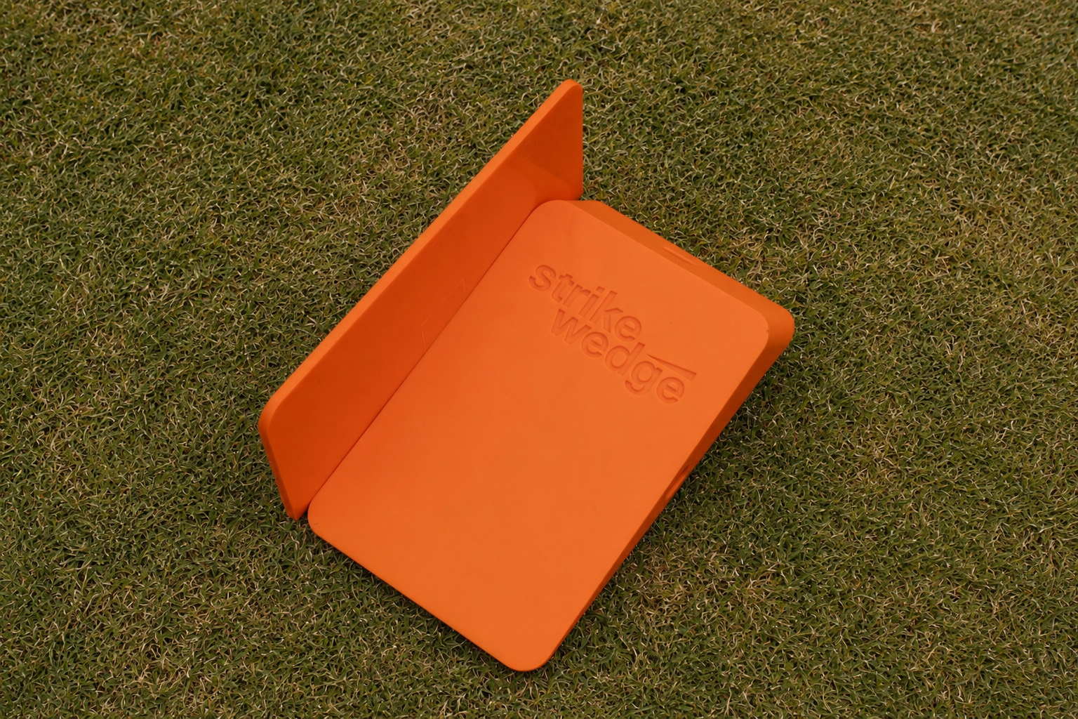 Close-up view of the Strike Wedge TPU training block showing its molded construction